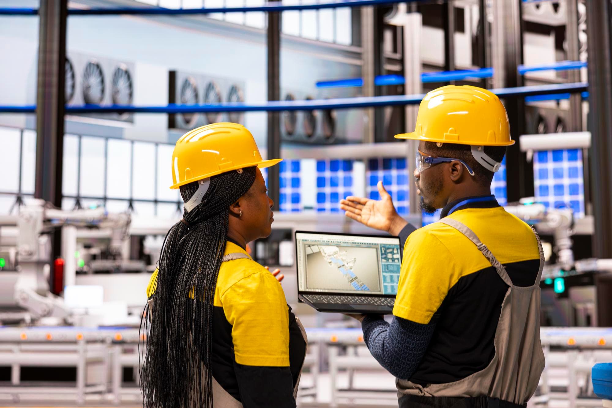 African professionals working with renewable energy and technology